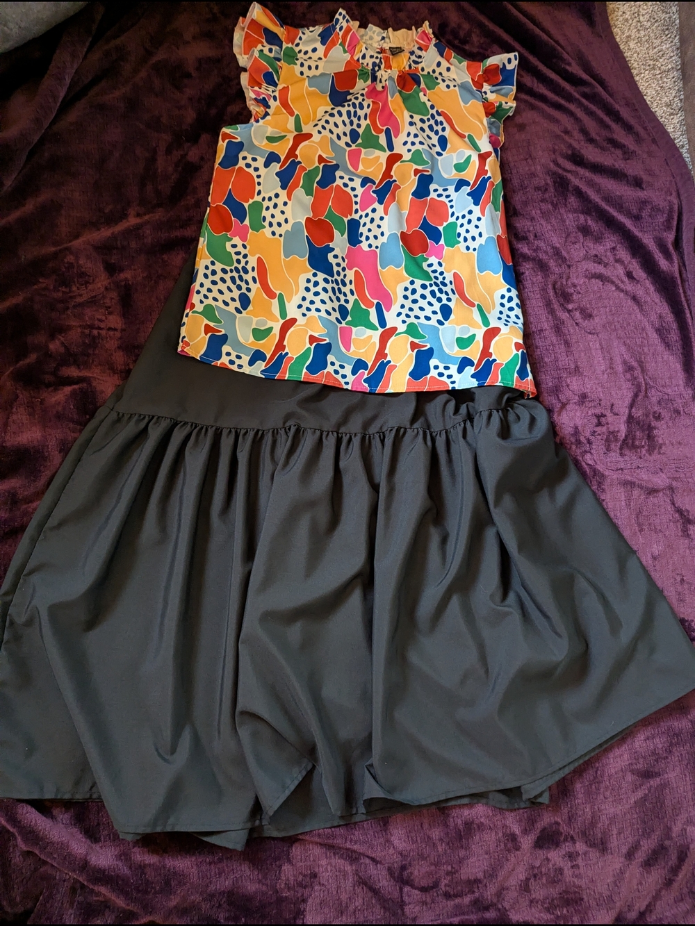 Colorful Abstract Ruffle Sleeve Top - Paired with Solid Black Ruffled Skirt